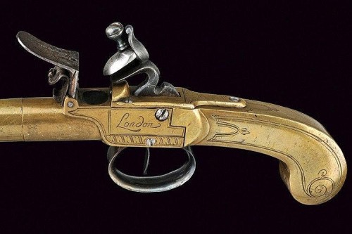 A gilt bronze flintlock pistol by Griffin of London, circa 1800.from Czerny&rsquo;s Internationa