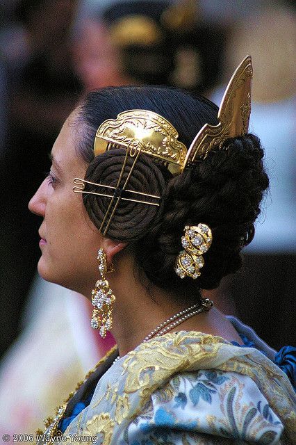 Hairstyle of the traditional fallera costume, Valencia, Spain. Traditionally, a lace veil headdress 
