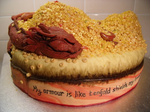 cupcakesandqwaffles:  My Smaug/Hobbit cake, titled ‘The Decoration of Smaug’ I finally finished the Smaug cake! After weeks of work, this is the finished product! I’m delighted with how it turned out, I’m glad I made the choice to hand-make all