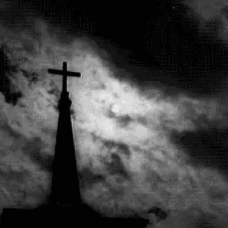 a black and white gif of clouds flowing over a church