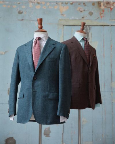 With our Spring/Summer collection comes the introduction of the Model 103, made almost completely by hand in Italy. It is the pinnacle of The Armoury’s in-house offerings.
Featuring an unpadded shoulder and enlarged sleevehead, the jacket is...