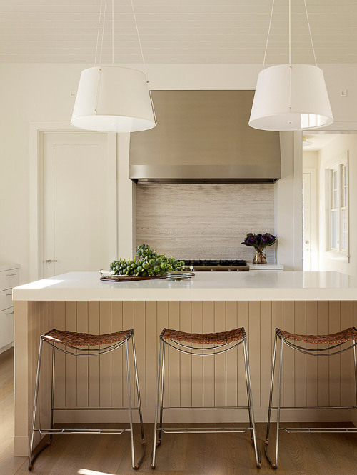 {This home by Kara Mann and Andrew Mann (husband and wife?) has a nice twist on traditional - modern