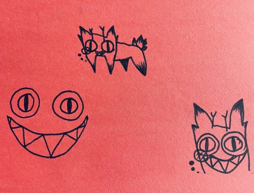 doodles of cursed cat alastor
