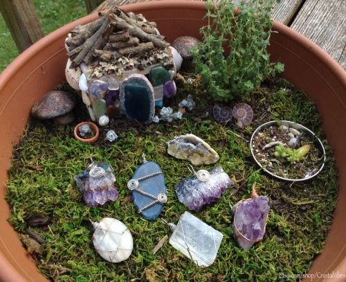 forestvibrations:  Some of my crystal beauties in the yard of my faerie house. All jewelry in this photo is for sale in my shop, check it out!Etsy.com/shop/CrystalVibes ☮ 