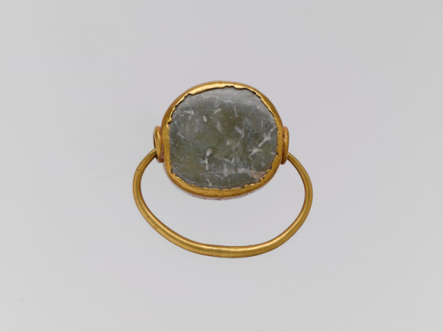 the-met-art:Gold hoop with picrolite stone in gold setting, Greek and Roman ArtMedium: Gold, steatit