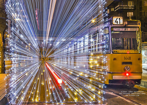 archiemcphee:  Each year during the Christmas season in Budapest, Hungary the city trams are each decorated with over 30,000 bright, twinkling LED lights.  “The tradition began in 2009 and has been a hit with passengers ever since. The lit up trams