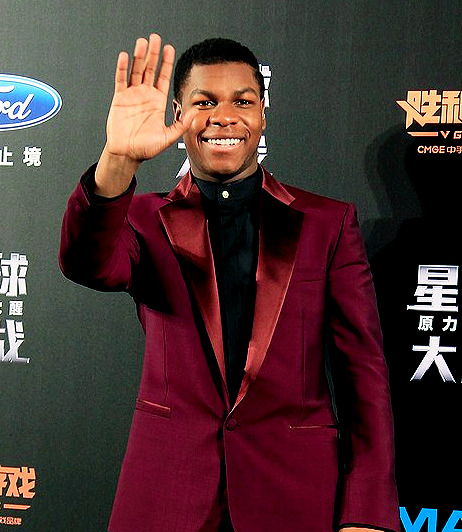 theblogofeternalstench: John Boyega’s colourful premiere suits. 