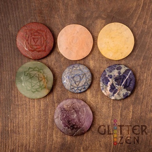 These are raised, embossed chakra symbols on round stones. These are amazing! Etsy link in Bio! . . 