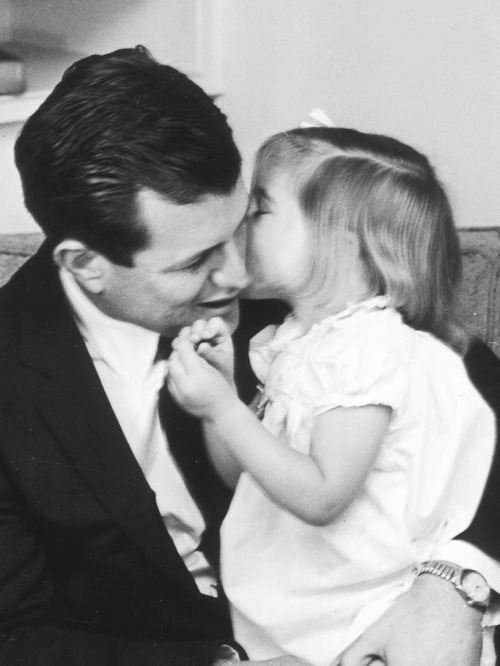 November 1962, Joan &amp; Ted pose with their kids, Kara &amp; Ted Jr., at home for the Bost