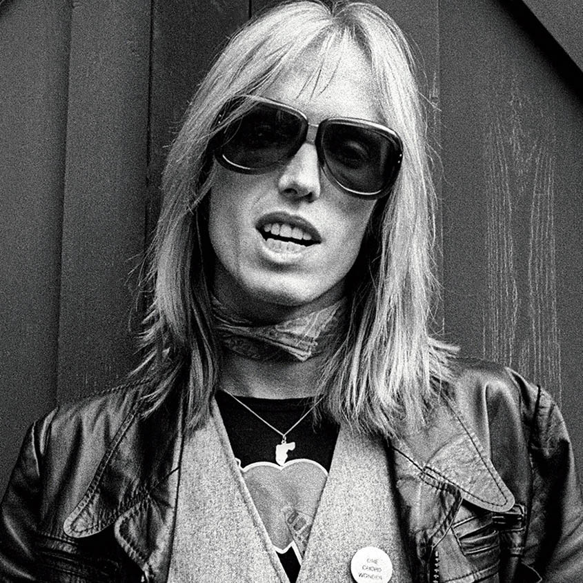 soundsof71:Tom Petty, whose button reads “One Chord Wonder”. “We had to be