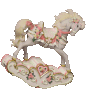 A vintage looking rocking horse;it is decorated with flowers and frills