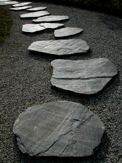 thekimonogallery: Rocks in a Japanese Zen garden represent islands, mountains, or other land mass. T