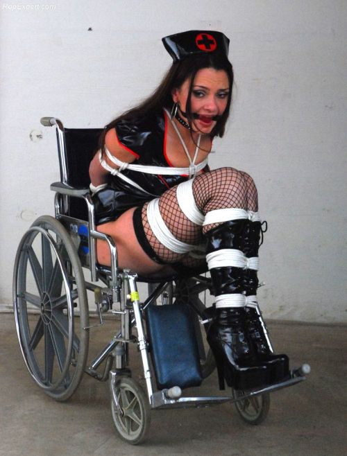 graybandanna:  Evil nurse tied to a wheelchair 