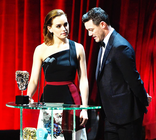 Daisy Ridley and Luke Evans presenting the Best Visuals Award at the 70th EE British Academy Film Aw