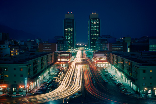 At night, the city lights and traffic in Caracas, Venezuela, show a flourishing metropolis, January 