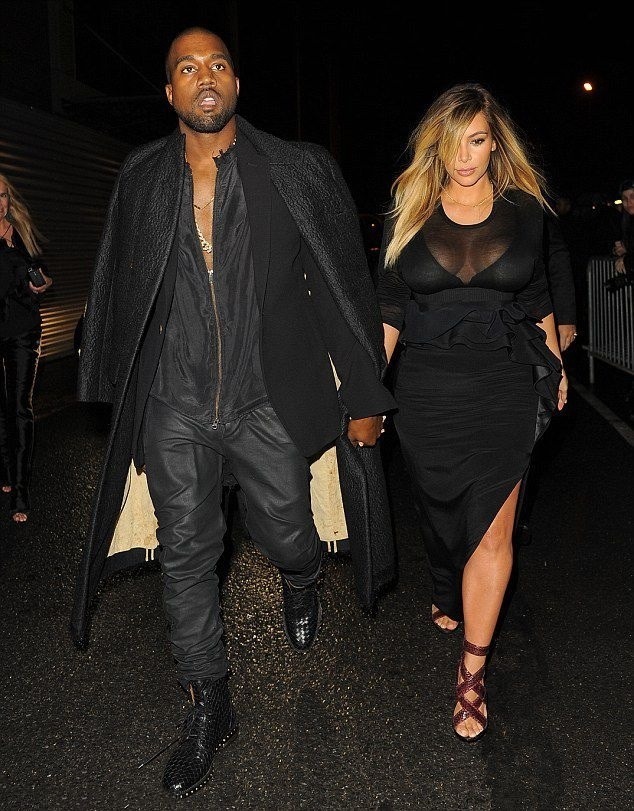 theakav:  Kanye and Kim arriving at the Givenchy show.