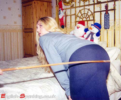 nbspanking:  Lucy Bailey bends for the first part of her Christmas present  Now raise your skirt