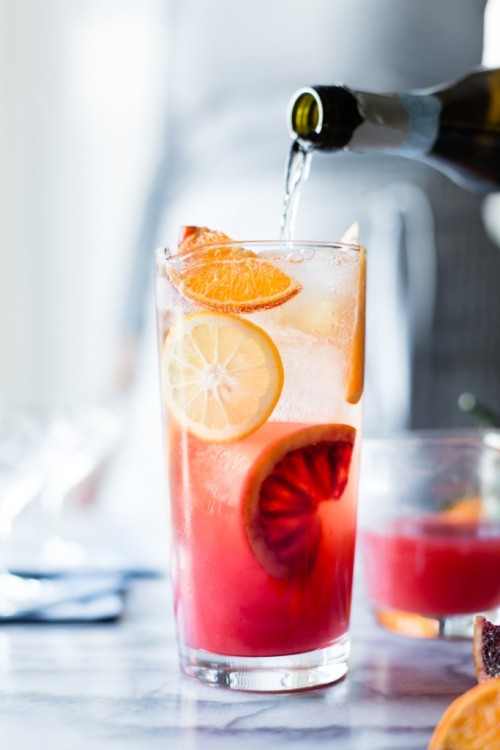sweetoothgirl:  sparkling citrus, lillet & prosecco punch    Because juice in the morning is important.