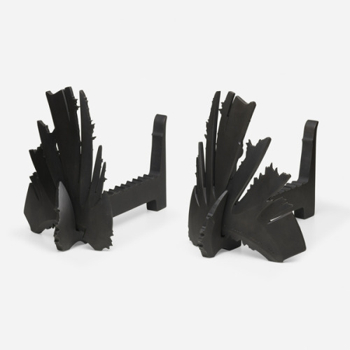 Albert Paley, Andirons, pair, USA, 1992,Formed and fabricated steel with a blackened finish,15¼ h × 