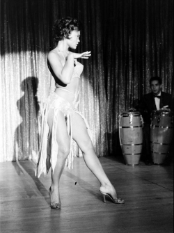 twixnmix:  Eartha Kitt performing at El Rancho Vegas in 1955.  Photos by George Silk   for LIFE magazine      Eartha Kitt rocking it!