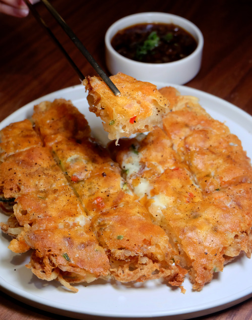 Hogam Jeon-  Layered with prawns, shredded zucchini, potato, and cheese