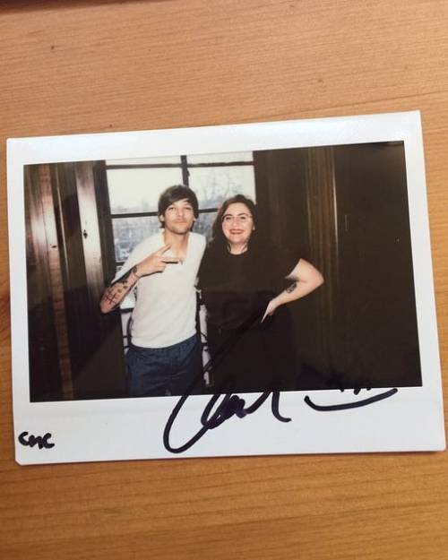 Louis with a fan at the filming of the Two of Us music video in London - 05/03
