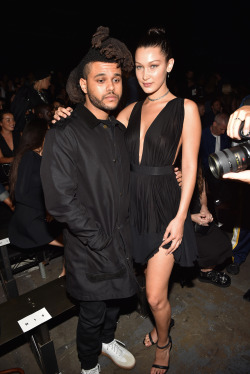 celebritiesofcolor:The Weeknd and Bella Hadid attend the Alexander Wang Spring 2016 fashion show during New York Fashion Week at Pier 94 on September 12, 2015 in New York City.