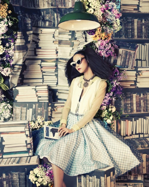 Ji Hye Park reading with books galore. Photographed by Bosung Kim for Vogue Korea, June 2012.Vogue K