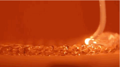 mentalflossr:  Watch This 3D Printer Print Mesmerizing Glass Goo