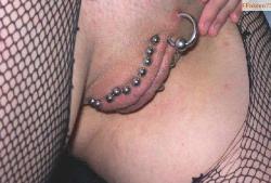 Ten bars chastity piercing.