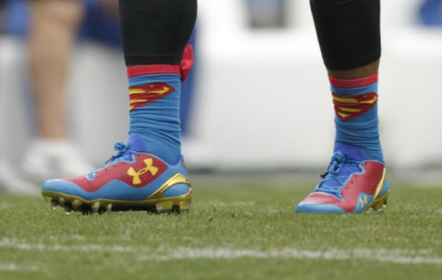 Cam Newton going with Superman socks and cleats today. 