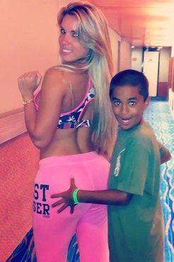 unnaturally-beautiful:  Kathy Ferreiro and one lucky kid.