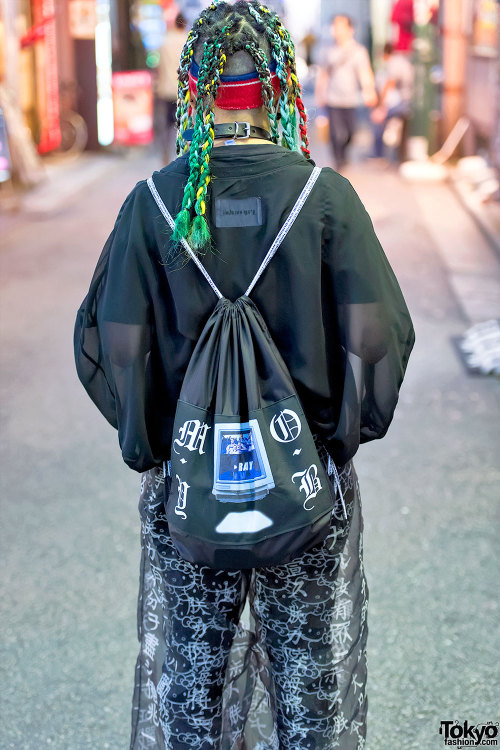 19-year-old Juria on the street in Harajuku wearing a sheer Yaponskii top, layered Buccal Cone and H