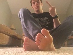 spiritpawz:My head is fucking killing me boys. While I recuperate from the New Years, you bitches should be at my feet servicing them. Your rightful places are under my fucking feet.