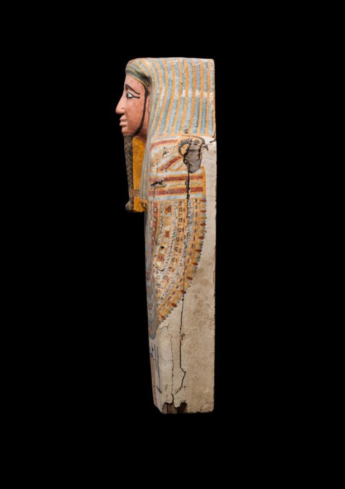 The Upper Part of an Egyptian Polychrome Wood Coffin Cover25th/26th Dynasty, 750-525 B.C.Wearing a b