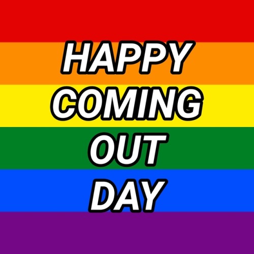 (Image Description: the rainbow flag with the words “Happy Coming Out Day” on top)