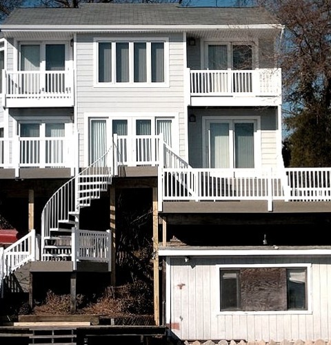Photo Of A Spacious, Elegant Backyard Deck Without A CoverLarge Elegant Backyard Deck Photo With No Cover