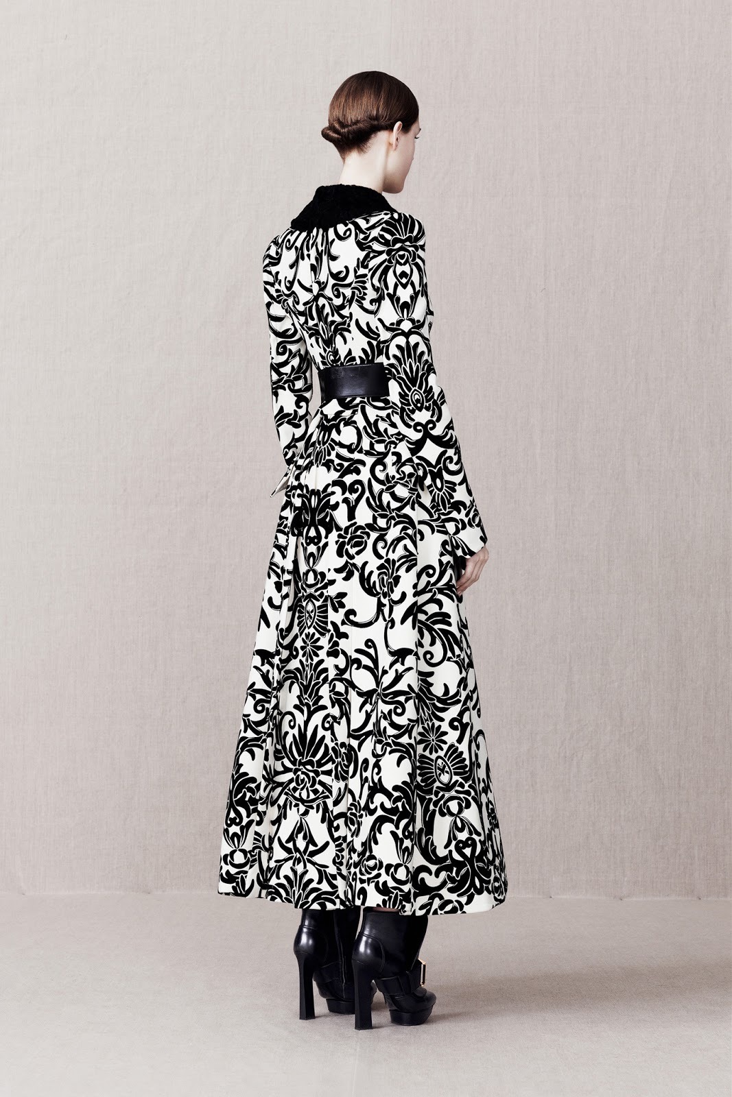 gothiccharmschool:  The black &amp; white coat! Lots of interesting, pretty designs