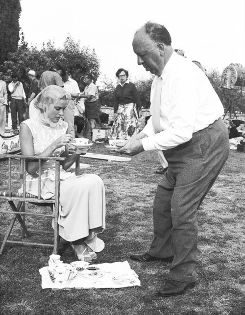 americanfilminstitute: Alfred Hitchcock serves tea to Grace Kelly on the set of Dial M for Murder (1