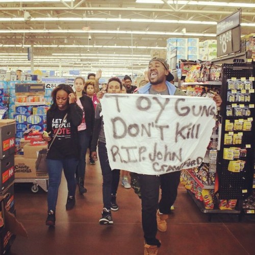 blackeducator:Attention shoppers! Walmart is being shut down! Justice for #JohnCrawford #CivilDisobe