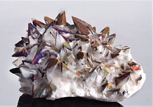 lavenderwaterwitch: bijoux-et-mineraux: Iridescent Chalcopyrite over Calcite - Edong Mining District