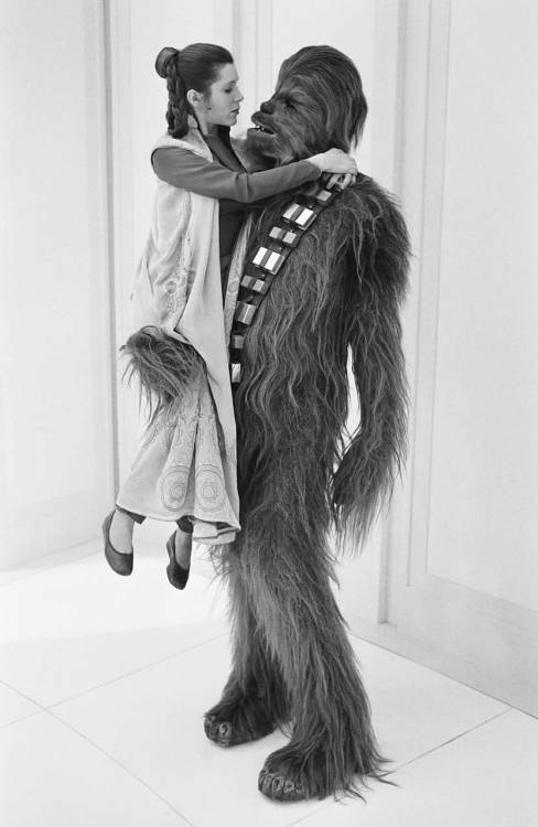 retrostarwarsstrikesback: In need of a lift, Carrie Fisher and Peter Mayhew on the set of Empire Str