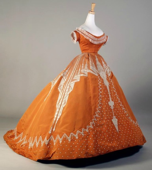 1865-67 House of Worth Orange Silk Evening Dress with White Embroidery. (Kent State Museum)
