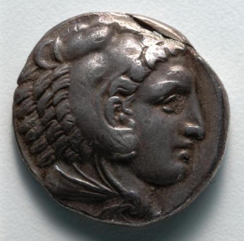 cma-greek-roman-art:Tetradrachm: Head of Young Herakles in Lion Skin (obverse), 336, Cleveland Museu