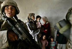 soldiers-of-war:  Anja Niedringhaus was part of the AP team that won the 2005 Pulitzer Prize in breaking news photography for the coverage of the Iraq war. Here, US Marines of the 1st Division raid the house of a city council chairman in the Abu Ghraib