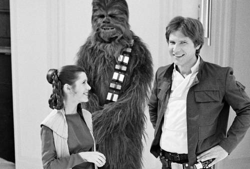 thestarwarsarchives:Carrie Fisher, Peter Mayhew and Harrison Ford - The Empire Strikes Back