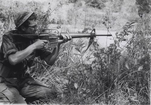 warhistoryonline: Marine Lance Corporal Joseph L. Atkinson, 19 (Norwood, Pennsylvania) firing from a