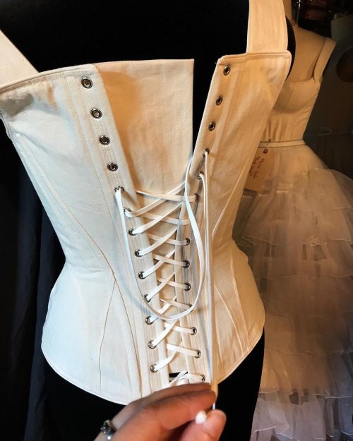 Tie it up to test it! The “Theda” from the back- our hybrid corset for #janekrakowski on Dickinson. 