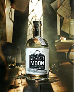 itllcometomesoon:  Midnight Moon Moonshine photos for one of their campaigns. The photos are by Vanessa Rees. I love the labels on these bottles so much and photos are amazing as well. 