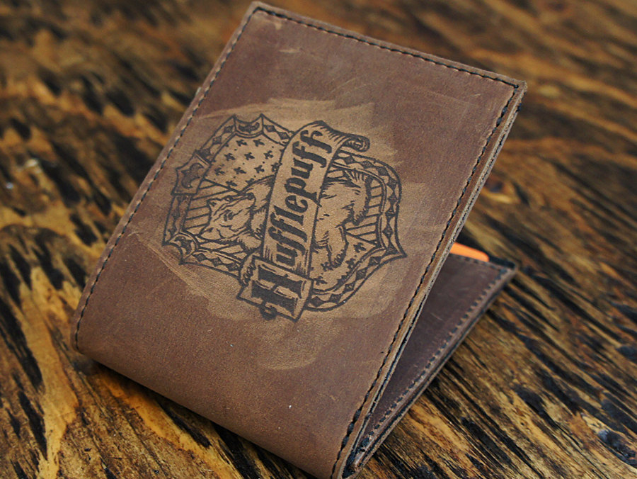 wickedclothes:  Harry Potter House Crest Leather Wallets Although these genuine leather